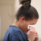 Latesha Clay cries at her sentencing. (Screenshot from MLive video of the sentencing.)