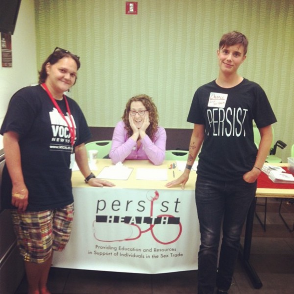 A community member, Zil Goldstein, and Chance Krempasky at Persist's first open house