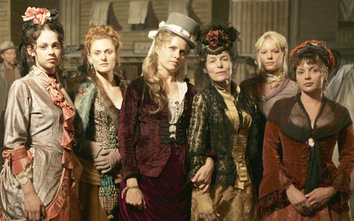 Joanie and the other women of the Gem Saloon. (Still from Deadwood)