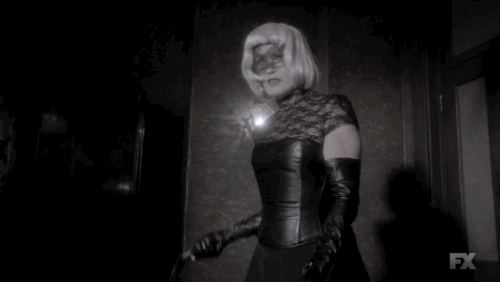 Jessica Lange as Elsa Mars in American Horror Story, flashing back to her pro domme past. (Gif based on screenshots from American Horror Story)