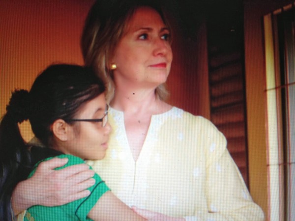 Hillary Clinton with Long Pros. (Photo via Nicholas Kristof's "Half The Sky" Pinterest)