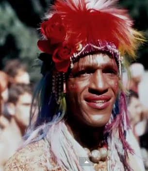 Marsha P Johnson, Stonewall riot participant, STAR House founder, ACT UP activist, and Black trans woman street sex worker. (Screenshot from "Pay It No Mind: The Life And Times of Marsha P Johnson")